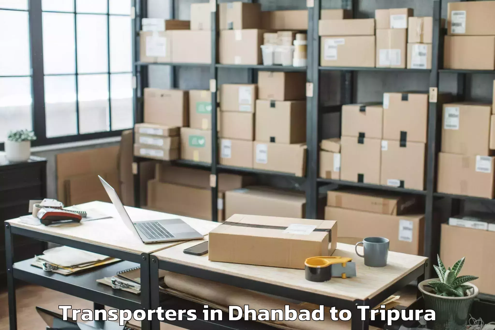 Professional Dhanbad to Khowai Airport Ixn Transporters